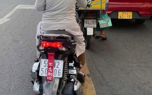 Dán "bùa" che biển số xe, 2 phụ nữ ở TPHCM bị mời đến trụ sở công an