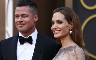 Brad Pitt và Angelina Jolie tình tứ tại Oscar 2014