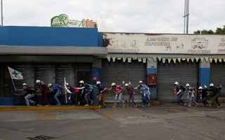 Venezuela: Bạo lực, cướp bóc gia tăng, 37 người chết