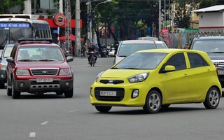 Grab,Uber và taxi truyền thống: Ai khổ vì ai!