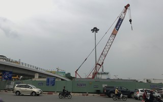 Cho một công ty tiếp tục thi công dự án cầu vượt cửa ngõ Tân Sơn Nhất