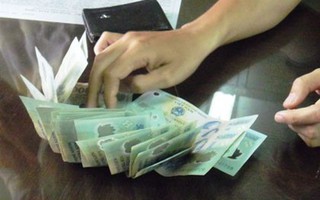 Tạm giữ 2 phóng viên nghi nhận tiền “làm luật” của doanh nghiệp