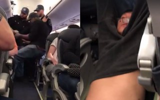 Hành khách bị lôi xềnh xệch khỏi máy bay Mỹ