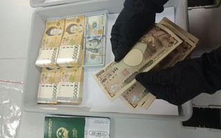Xách va li tiền sang Hàn Quốc, nữ hành khách bị tạm giữ