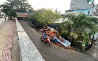 Hàng ngàn ngôi nhà "chìm" dưới mặt đường ở TP HCM