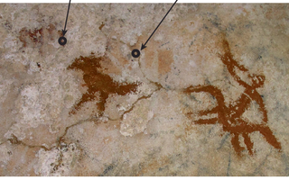 Phát hiện tác phẩm nghệ thuật trên đá cổ nhất thế giới ở Indonesia