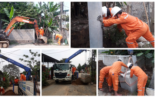 Dưới nắng gắt, công nhân điện lực thay từng cột điện cũ ở Quảng Trị