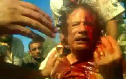 Bán đấu giá nhẫn cưới, áo dính máu của ông Gaddafi