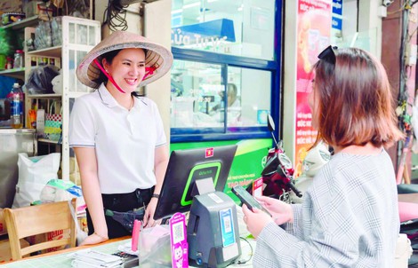 MoMo giúp tiểu thương gỡ nút thắt, chuyển đổi số