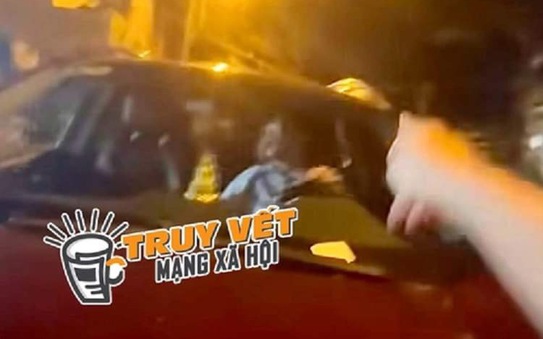 Sự thật về clip người đàn ông chạy ô tô trên nắp capo có một phụ nữ