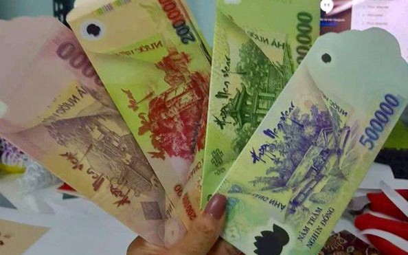 Xếp tiền thành cây tài lộc, in lên bao lì xì có thể bị phạt tới 80 triệu đồng