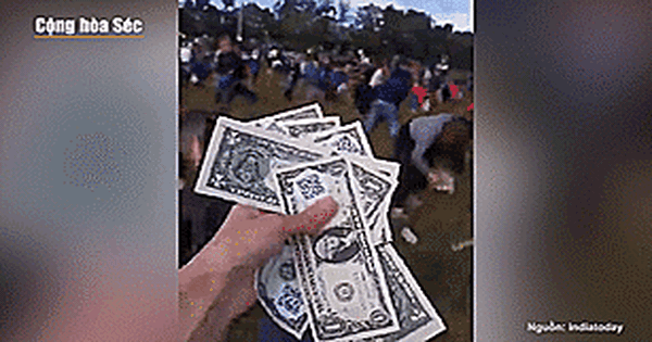 Czech Republic: Man playing float throws one million dollars from helicopter