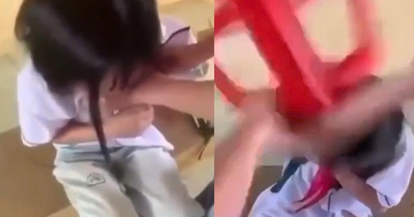 Nữ sinh lớp 8 bị bạn dùng ghế đánh vào đầu, cởi áo giữa lớp
