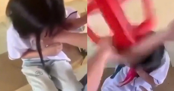 Nữ sinh lớp 8 bị bạn dùng ghế đánh vào đầu, cởi áo giữa lớp