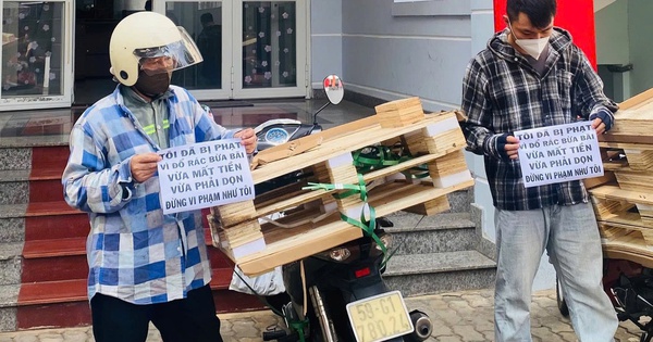 Hai người đàn ông ở TPHCM bị xử phạt vì vứt rác trên đường Nguyễn Văn Linh